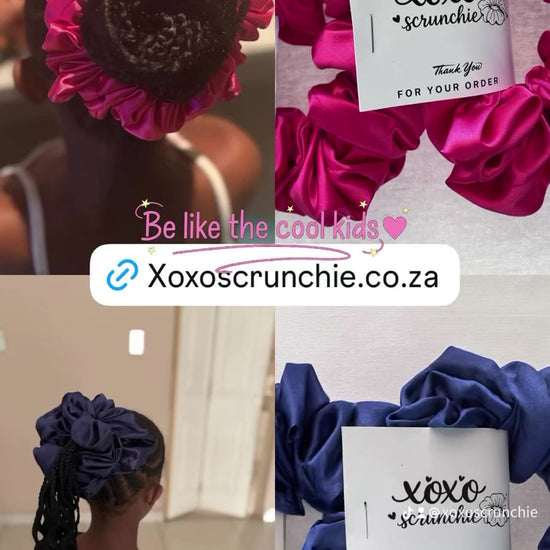 Child wearing pink satin hair scrunchie in ponytail